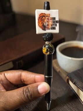 Handcrafted Black Decorative Pen with Lion and Yellow Accent